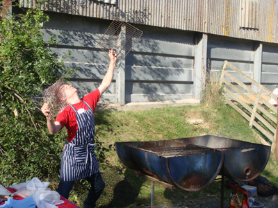 Andy getting the bacon sarnies going...